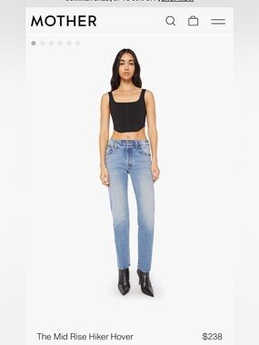 MOTHER Mid Rise Hiker Hover Straight Leg Jeans in Light Blue Wash.